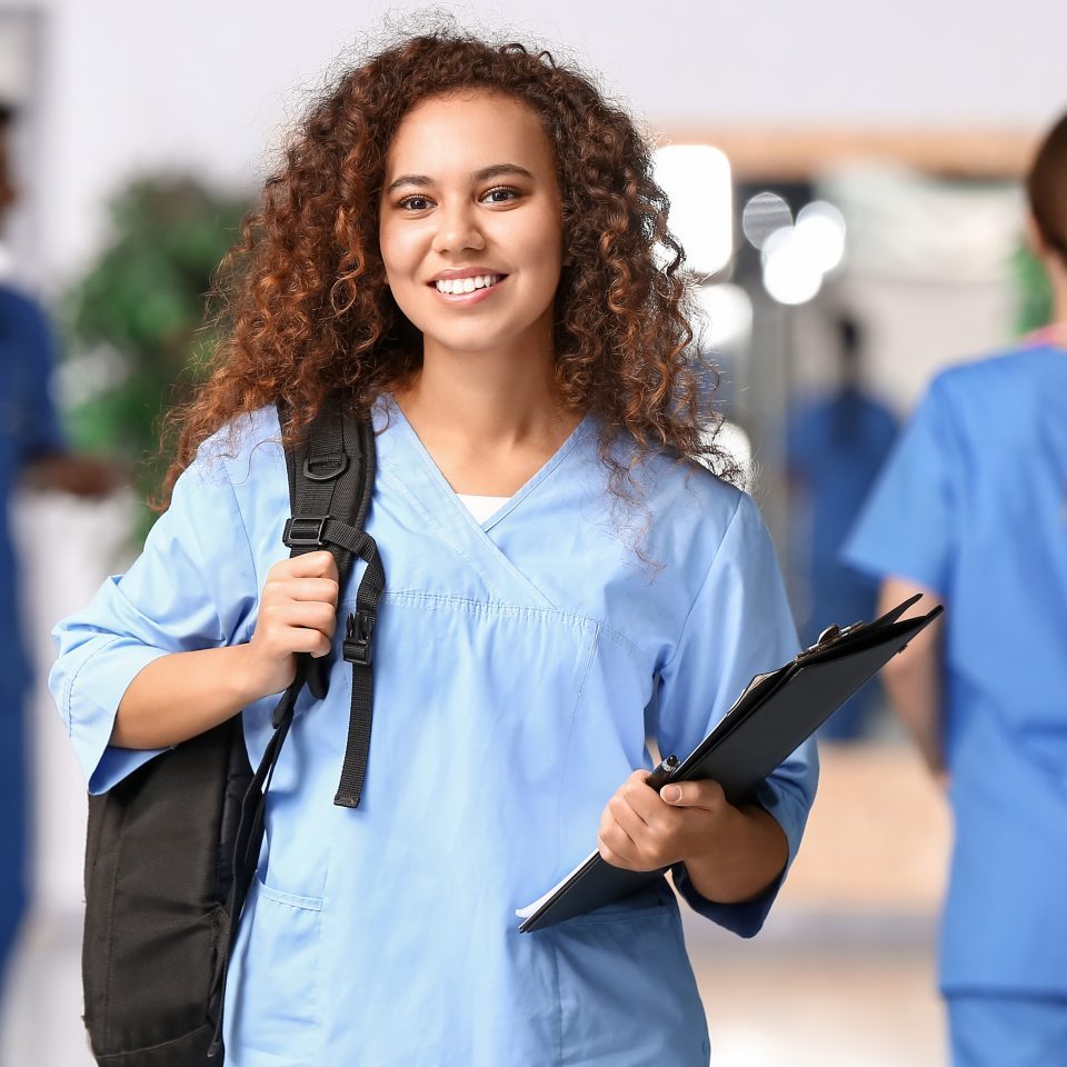 African-American student in hall of medical university
